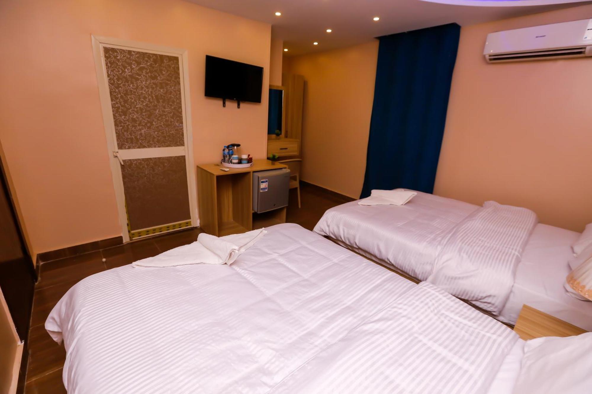 Pyramids Express View Hotel Kafret el-Gabal Exterior foto